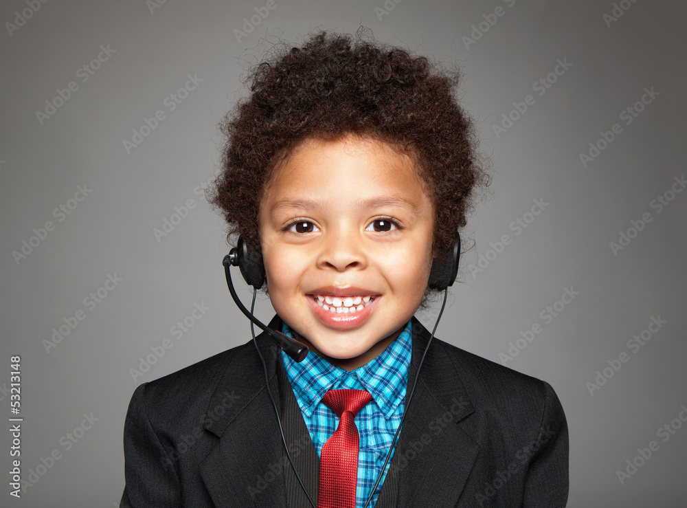 Smiling cute child with headphones and microphone Smiling cute child with headphones and microphone