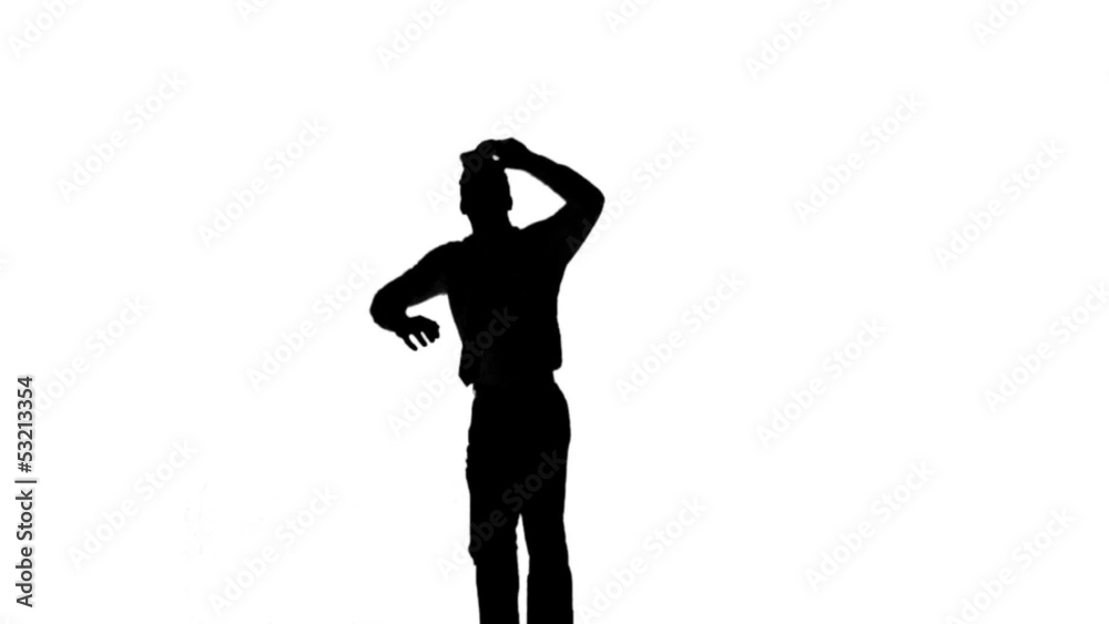 Silhouette of a jumping man turning on white background Silhouette of a jumping man turning on white background