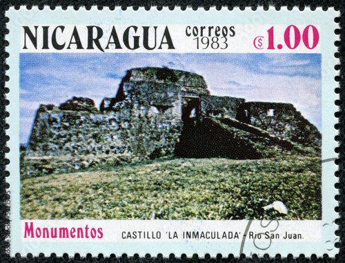 stamp shows the castle La inmaculada in Rio San Juan photo