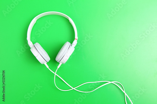 Headphone on green background