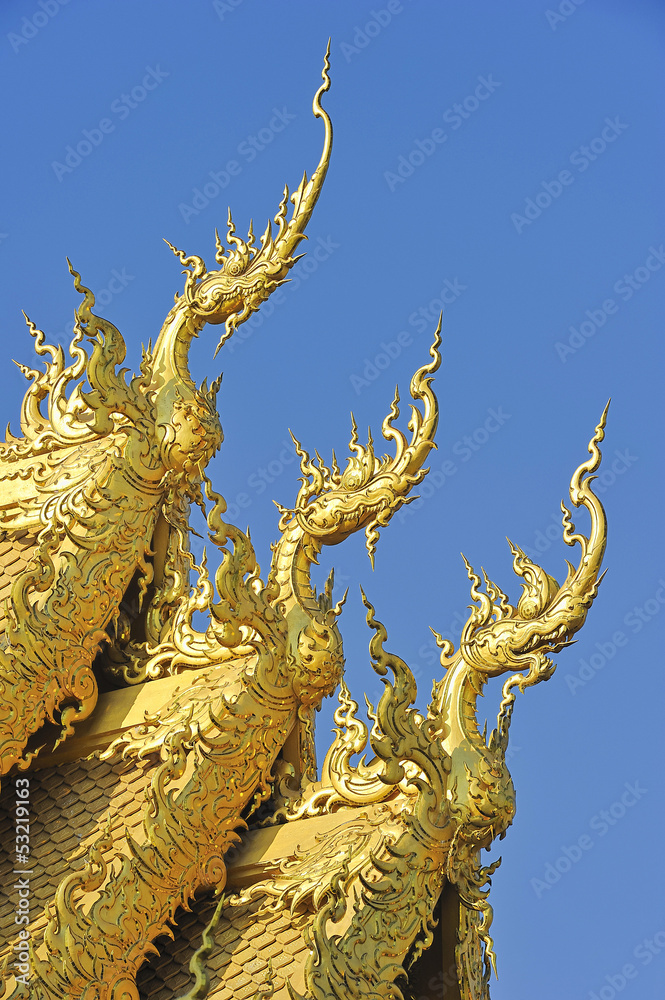 Golden roof on blue sky. Golden roof on blue sky.