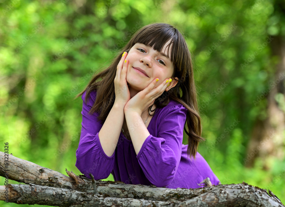 A little girl in a city park