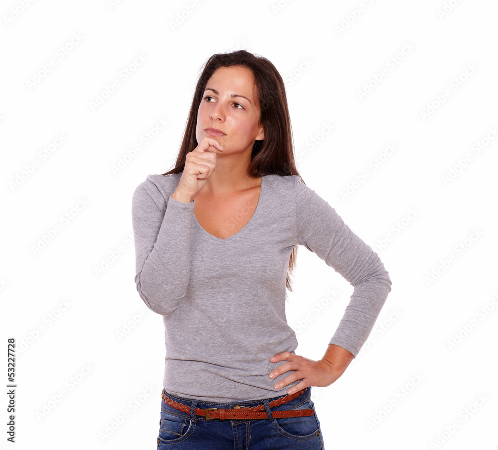 Reflective lady with hand on chin Reflective lady with hand on chin