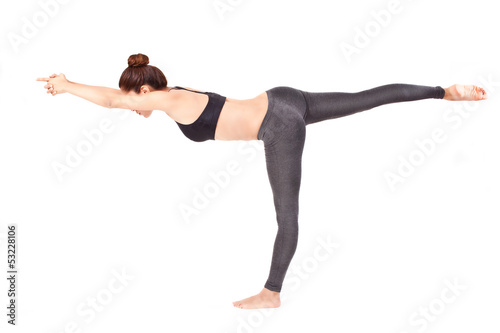 Two Yogi Female Partners in Balancing Stick Yoga Pose Stock Photo