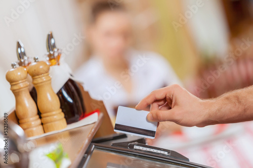 Close-up of cashier hands
