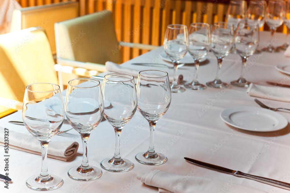Glasses on table at restaurant Glasses on table at restaurant