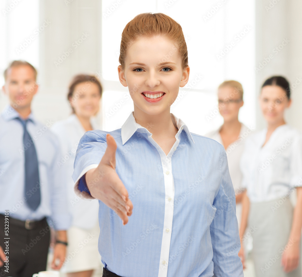 woman with an open hand ready for handshake