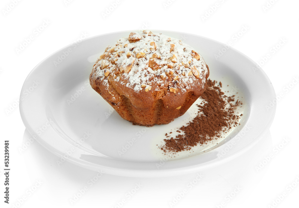 Tasty muffin cake with powdered sugar and cocoa