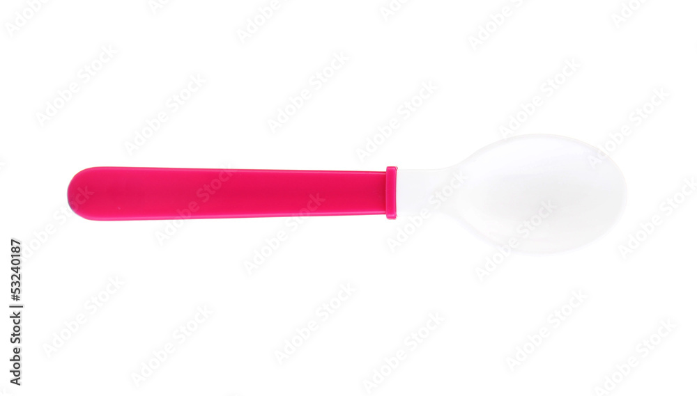Pink spoon for baby food isolated on white Pink spoon for baby food isolated on white