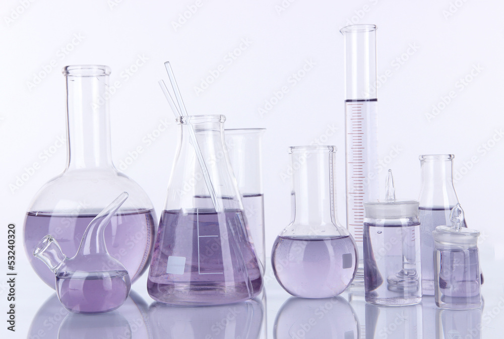 Test-tubes with light purple liquid isolated on white Test-tubes with light purple liquid isolated on white