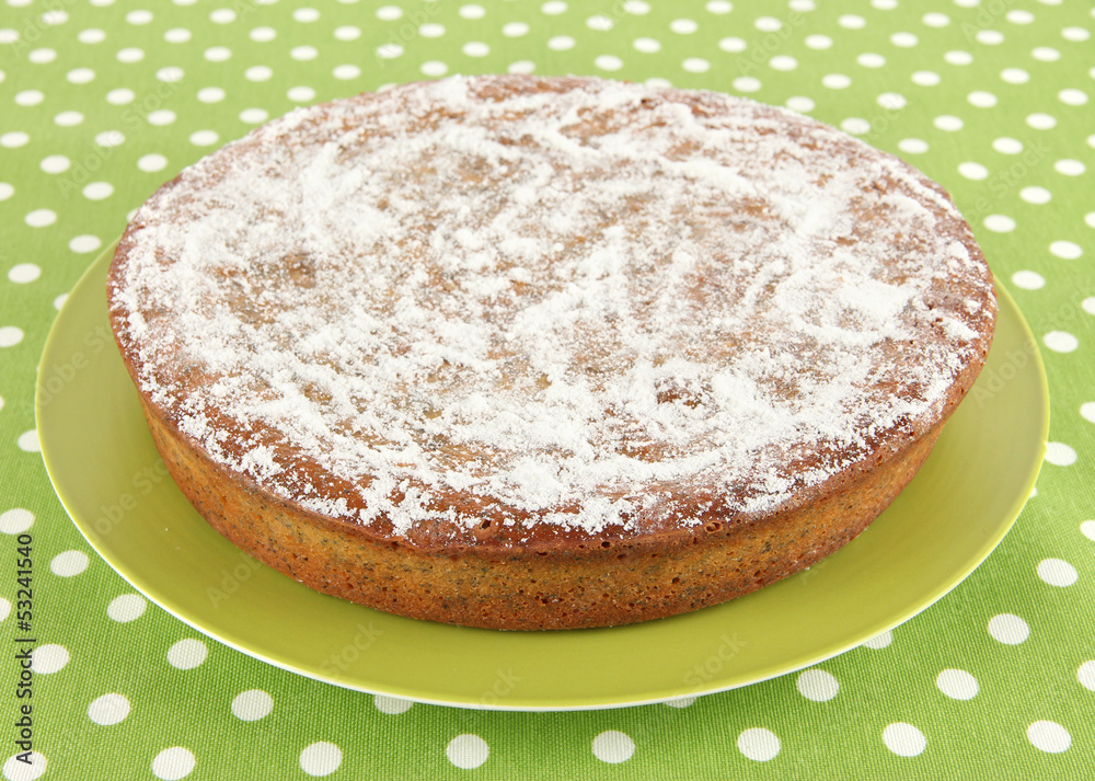 Delicious poppy seed cake on table close-up Delicious poppy seed cake on table close-up