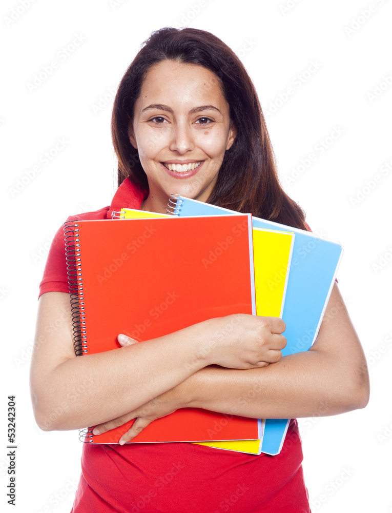 Happy female student carrying notebooks - isolated over a white Happy female student carrying notebooks - isolated over a white