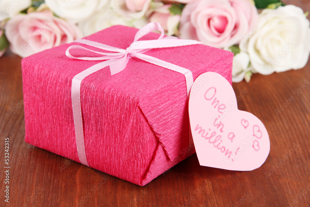 Romantic parcel on wooden background Romantic parcel on wooden background