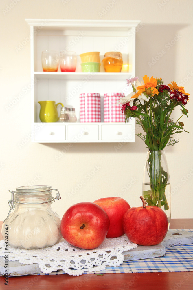 Kitchen composition on table on shelf background Kitchen composition on table on shelf background