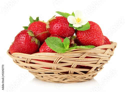 Ripe sweet strawberries in basket  isolated on white