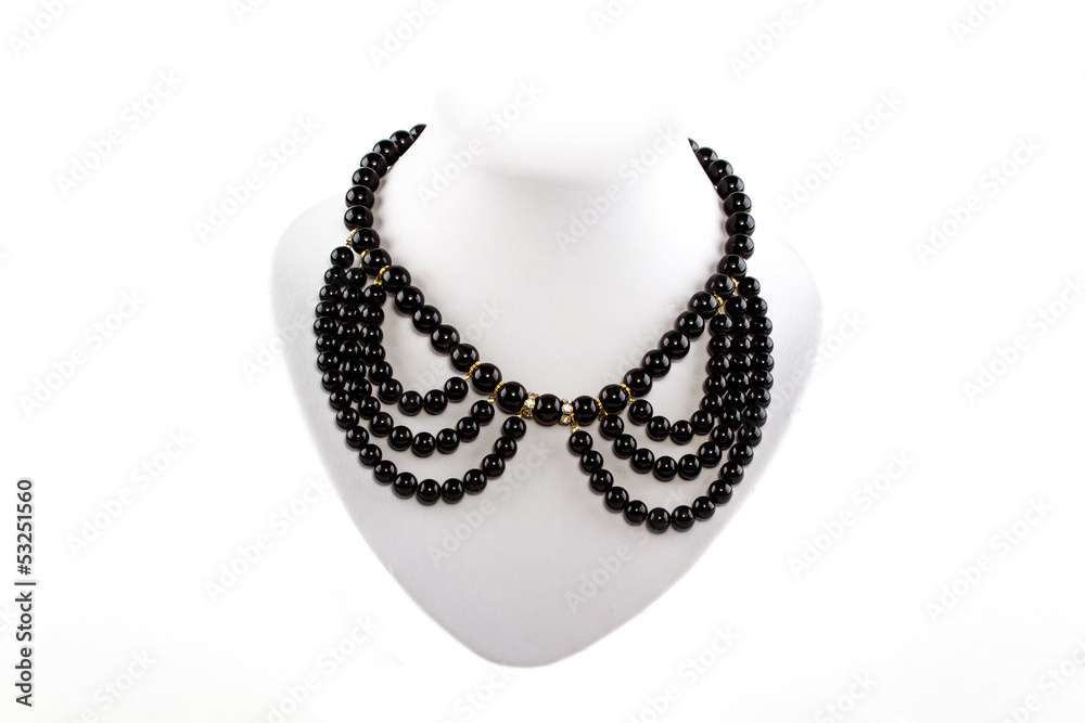 natural stone beads necklace on a stand natural stone beads necklace on a stand