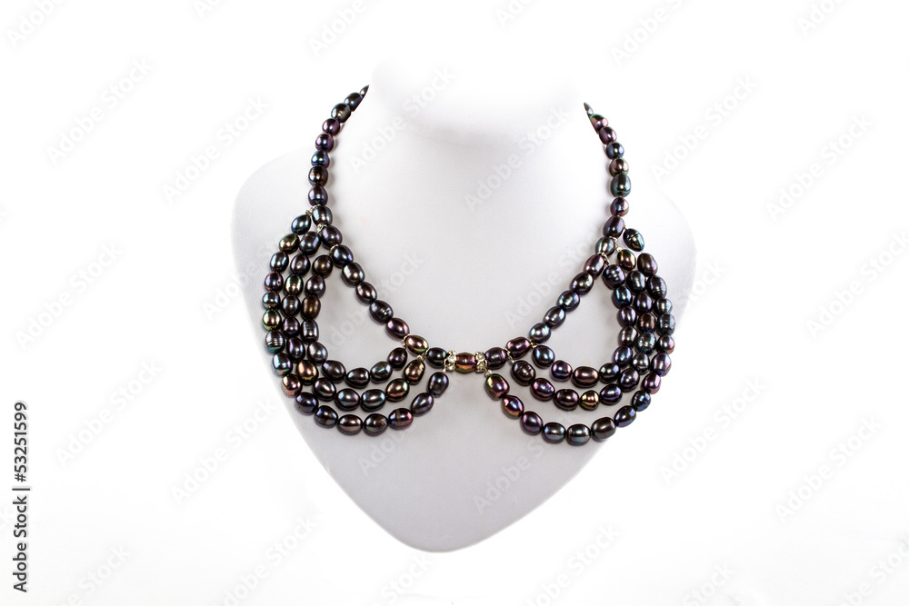 natural stone beads necklace on a stand natural stone beads necklace on a stand