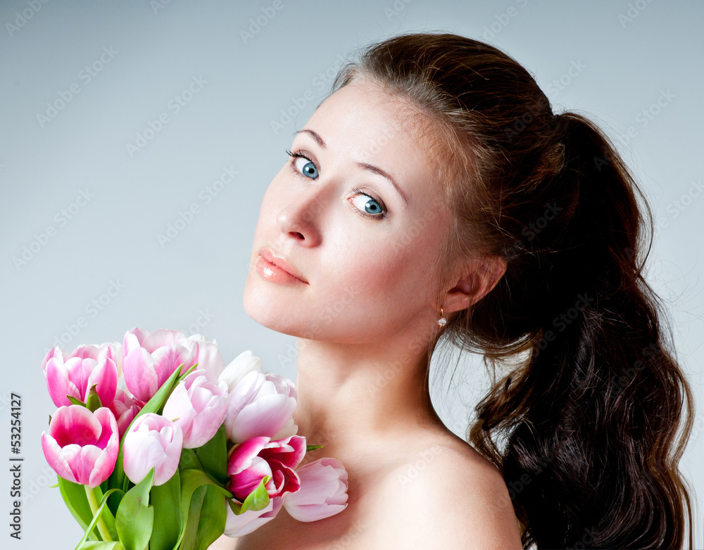 beautiful girl with a bouquet of tulips beautiful girl with a bouquet of tulips