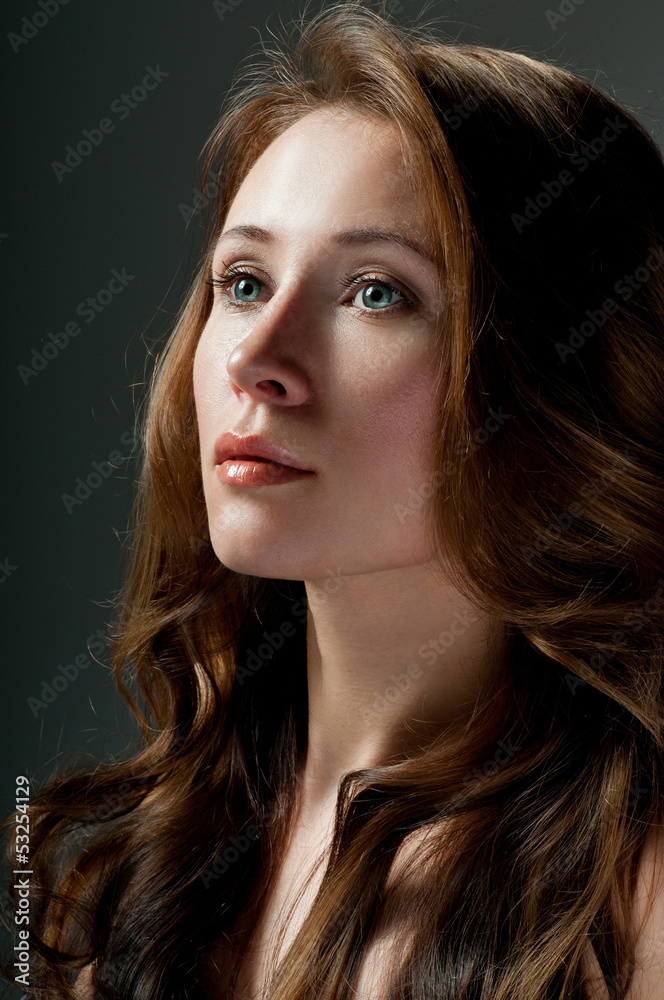 Naklejka premium beautiful girl with wavy hair