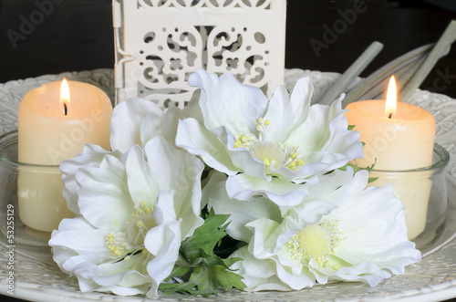 White flowers and candles on