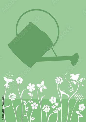 Gießkanne mit Blumen