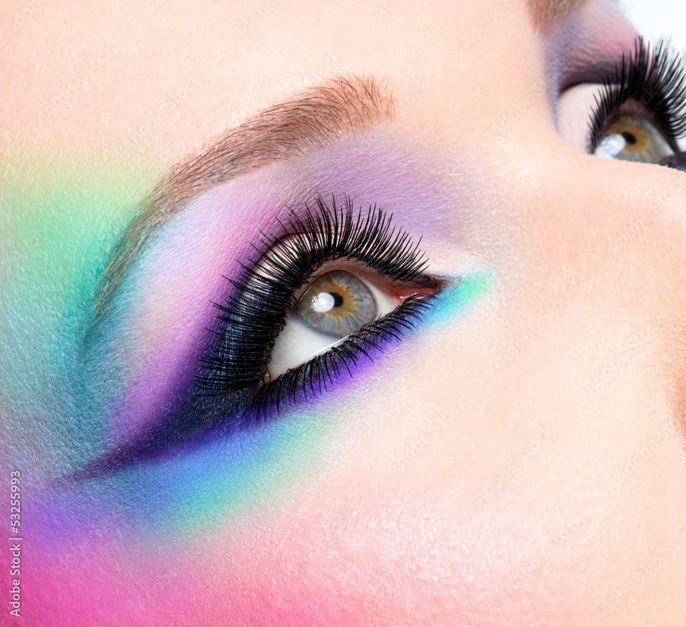 Fototapeta premium Woman eyes with beautiful fashion bright blue makeup