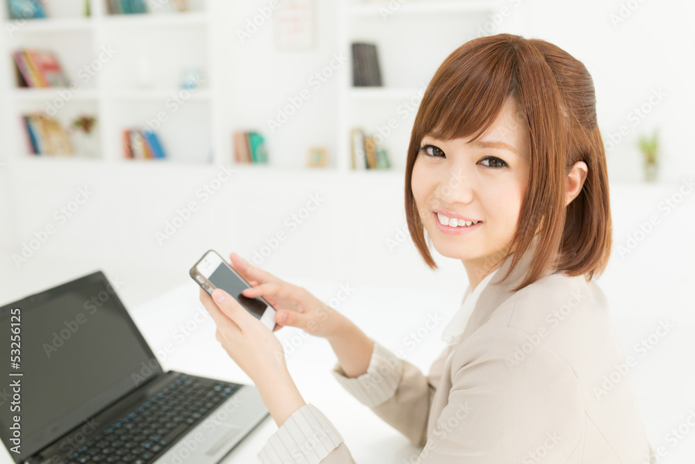 Beautiful young businesswoman working in office Beautiful young businesswoman working in office