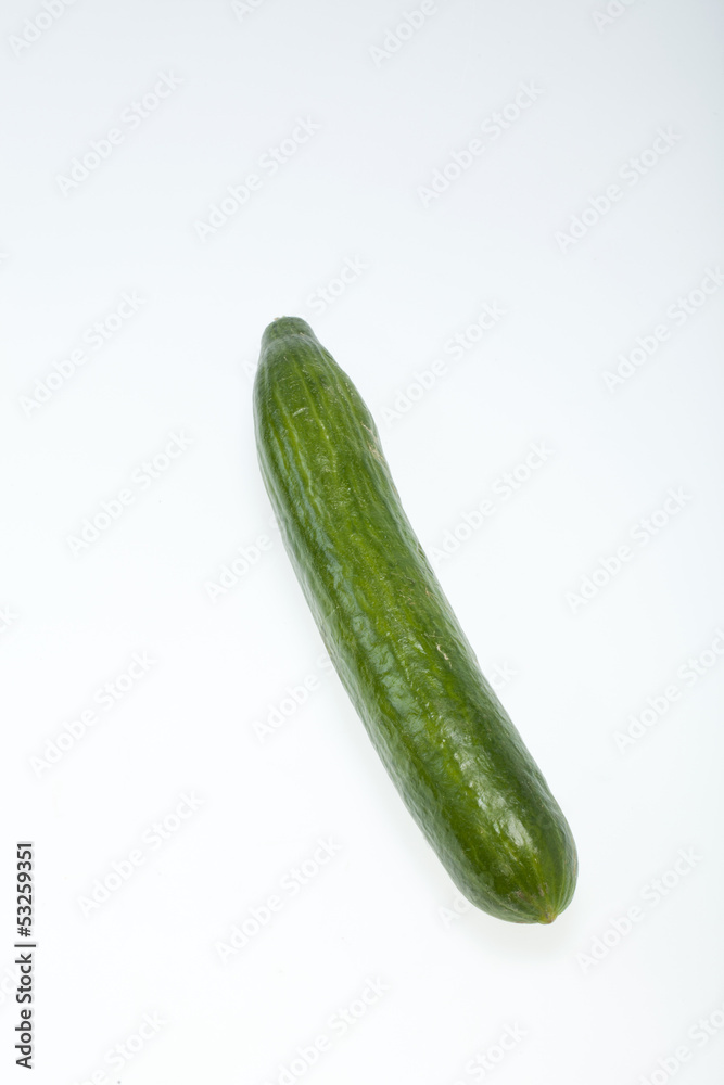 The green cucumber isolated on white background The green cucumber isolated on white background