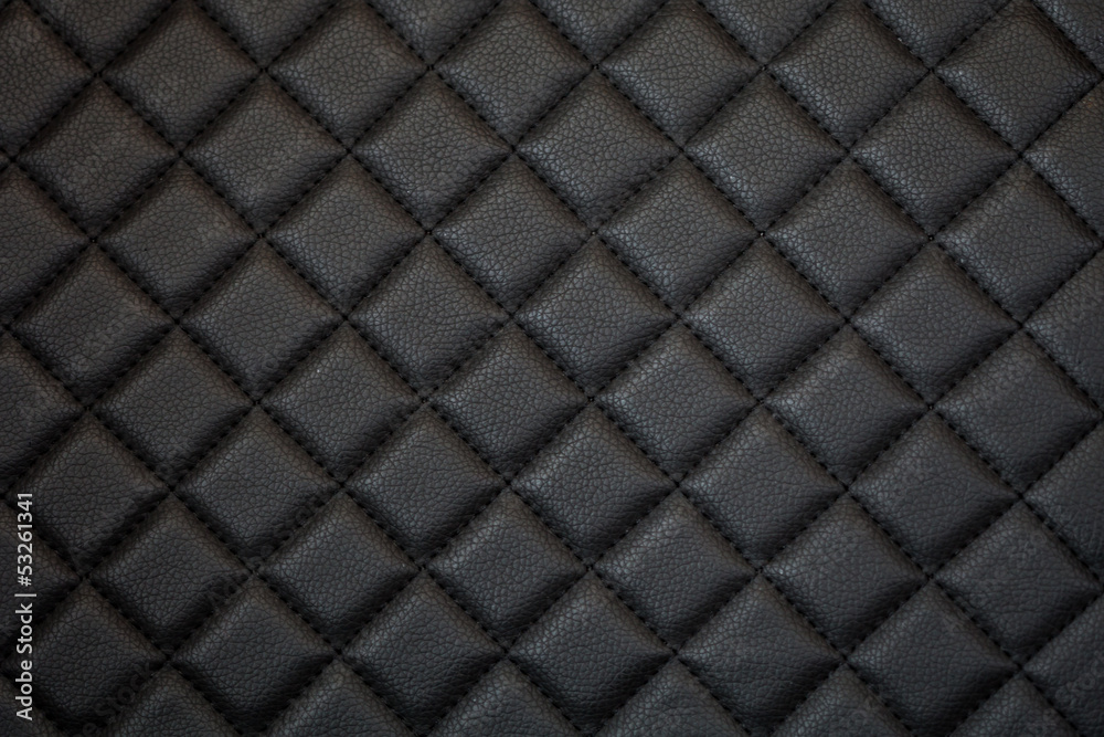 Fototapeta black leather texture of sofa closeup shot
