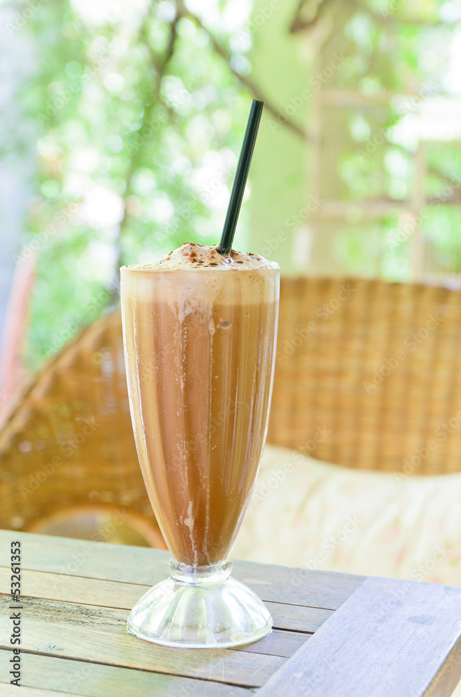 Ice Coffee on the wooden table Ice Coffee on the wooden table