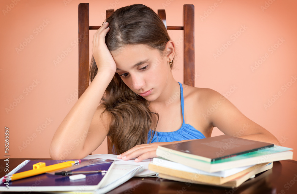 Hispanic student exhausted after studying too much Hispanic student exhausted after studying too much