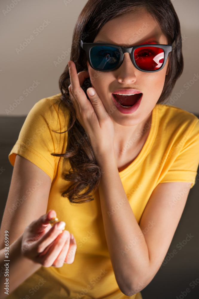 Expressive young woman watching 3d film Expressive young woman watching 3d film