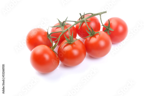 Bunch of cherry tomatoes on white background