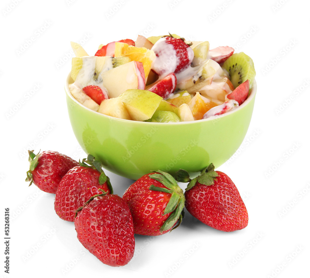 Useful fruit salad of fresh fruits and berries in bowl isolated Useful fruit salad of fresh fruits and berries in bowl isolated