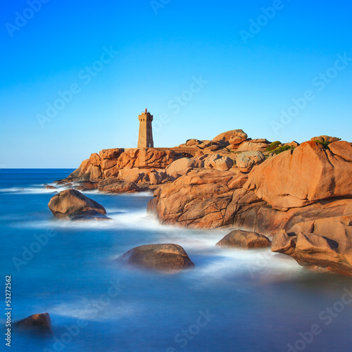 Ploumanach lighthouse sunset in granite coast, Brittany, France. Fototapet
