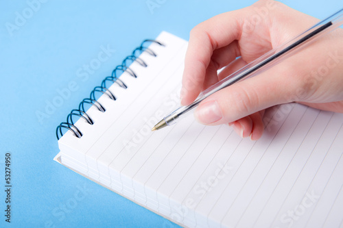 Foto Female Hand With Pen & Note Pad