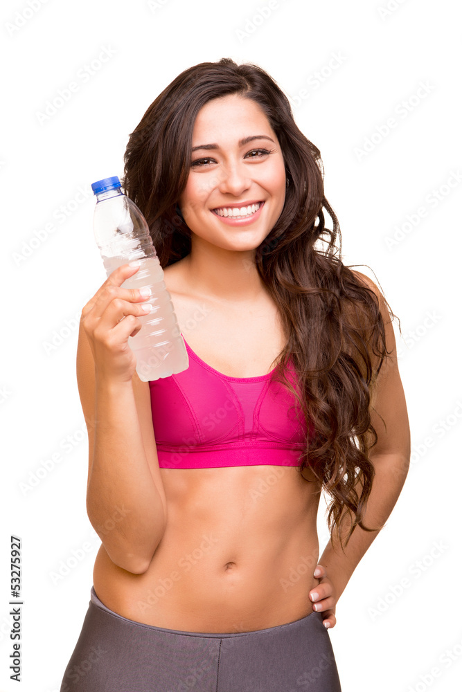 Attractive fitness woman holding a bottle of water Attractive fitness woman holding a bottle of water