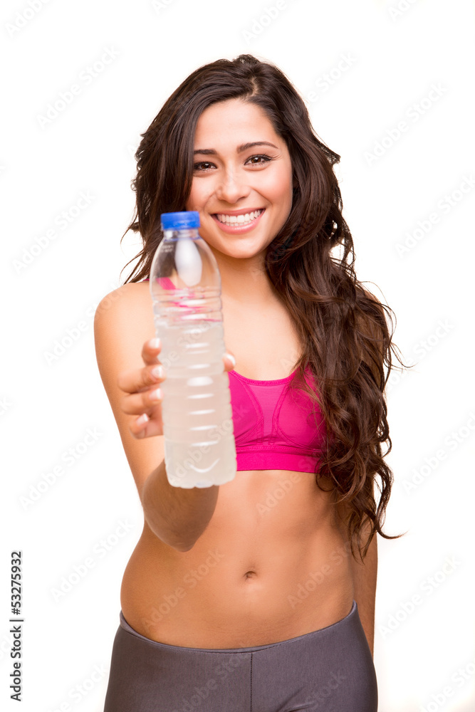 Attractive fitness woman holding a bottle of water Attractive fitness woman holding a bottle of water