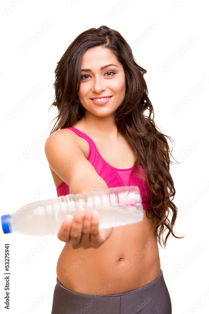 Attractive fitness woman holding a bottle of water Attractive fitness woman holding a bottle of water