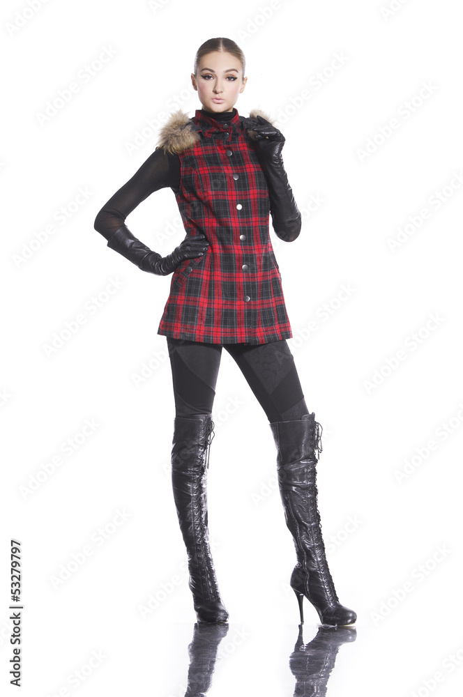 Full body portrait of a pretty young woman standing posing