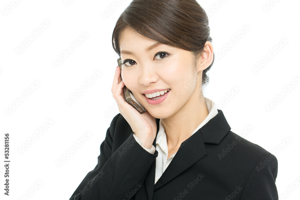 Beautiful asian business woman using a cellular Beautiful asian business woman using a cellular