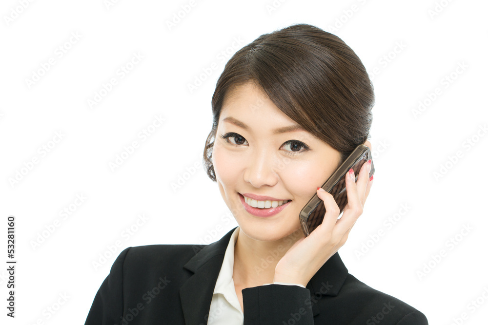 Beautiful asian business woman using a cellular Beautiful asian business woman using a cellular