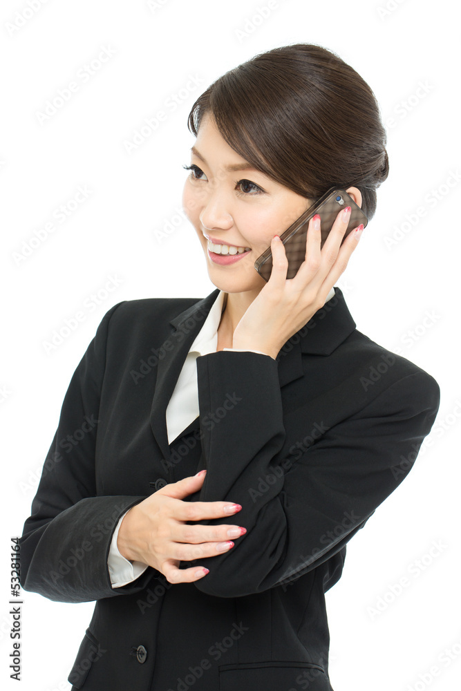 Beautiful asian business woman using a cellular Beautiful asian business woman using a cellular