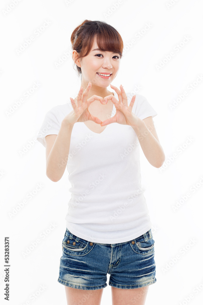 Beautiful Asian casual woman show heart shape. Beautiful Asian casual woman show heart shape.