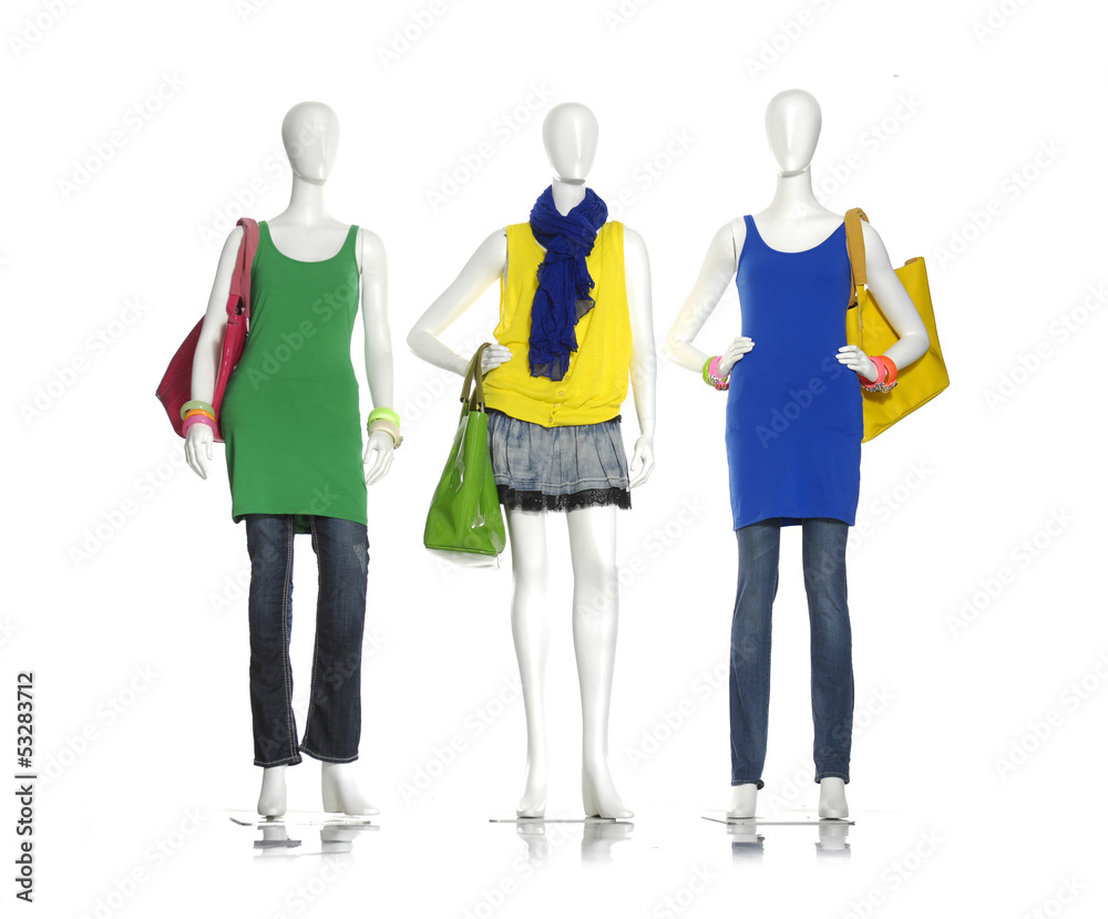 Obraz premium female colorful dress with bag ,scarf, on three mannequin