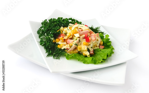 a salad of corn and Chinese cabbage