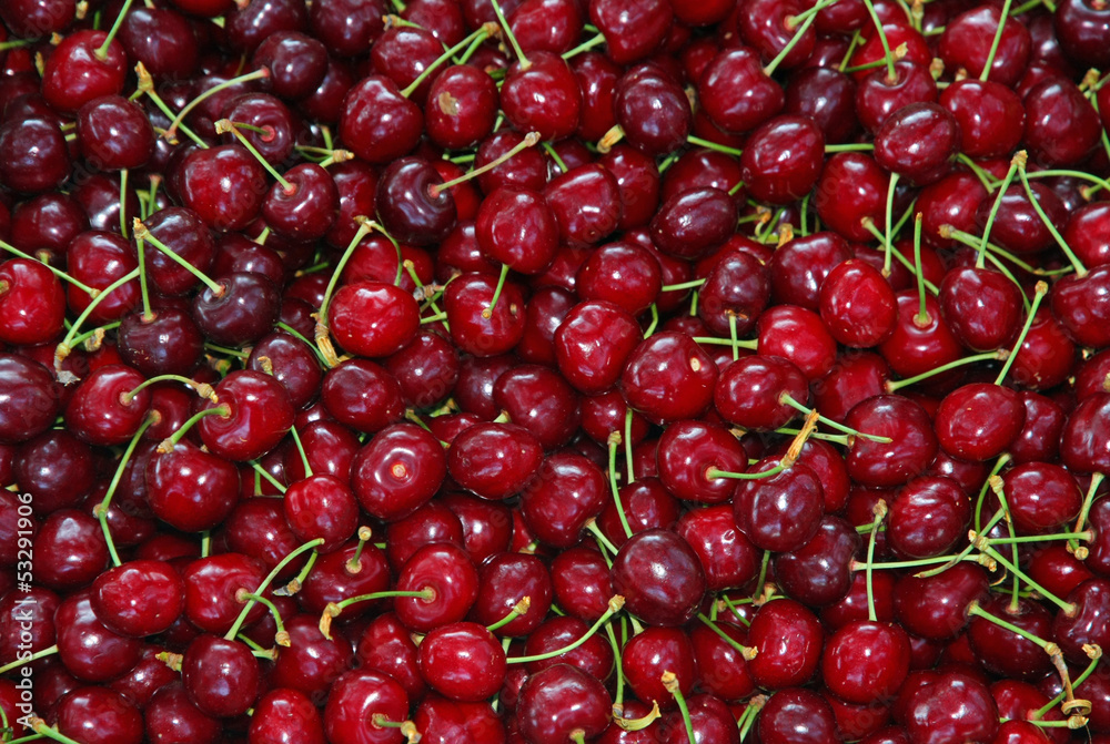 background of good and juicy ripe red cherries for sale background of good and juicy ripe red cherries for sale
