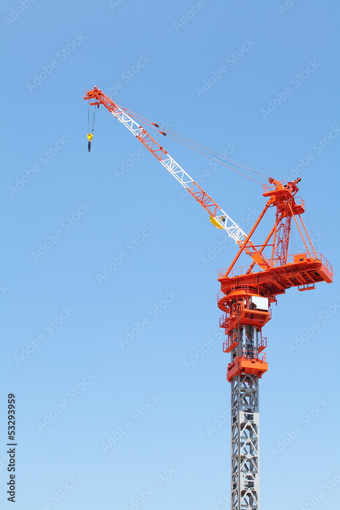 Construction site with crane over a building