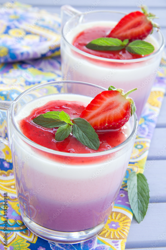 Panna cotta with strawberries and blueberries. Panna cotta with strawberries and blueberries.