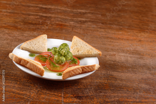 Healthy appetizer with toast and gnocci